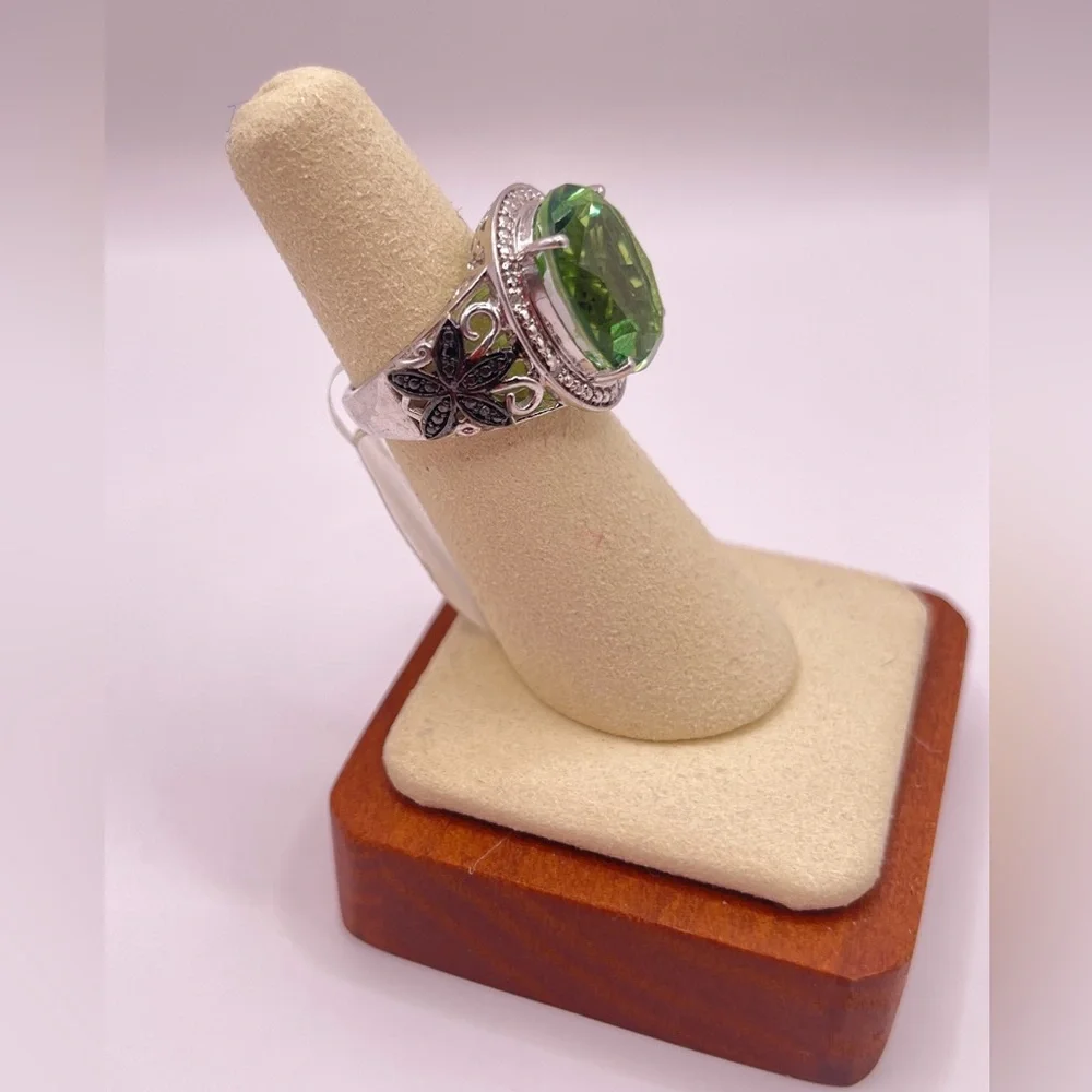 Simulated peridot in sterling silver with black rhinestone accents